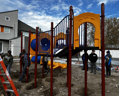 image of people constructing a playground